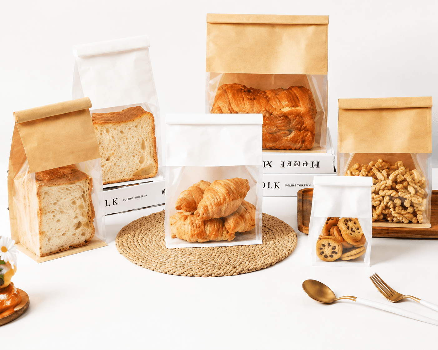 Bakery pouches filled with bread, croissants, cookies and snacks