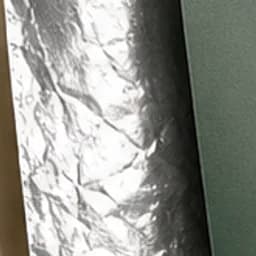 Primer plano de la película de embalaje flexible metalizada reflectante